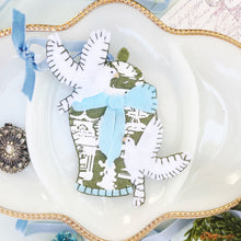 Load image into Gallery viewer, Turtle Dove Ornament on top of a ceramic tray