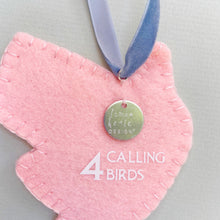 Load image into Gallery viewer, Backside of crane ornament and closeup of logo tag