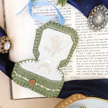Load image into Gallery viewer, Felt ring box ornament on top of a vintage book