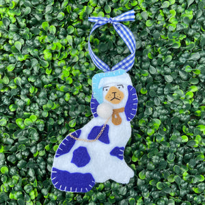 Left Staffordshire Dog Ornament with Blue Santa Hat