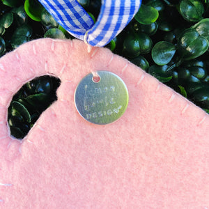 Closeup of Stamped Logo on the Back of Ornament
